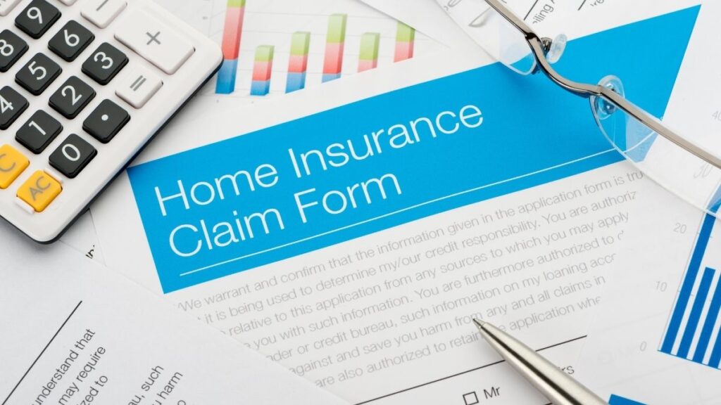 paperwork saying "home insurance claim form"
